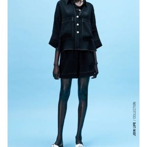 A beautiful oversized button down...